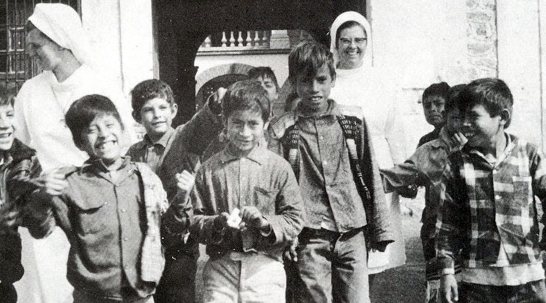 Fr. Wasson and the pequeños are grateful to have the help of the Sisters in 1974