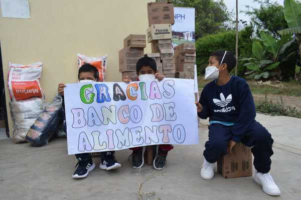Boys at NPH Peru: "Gracias Banco de Alimentos del Peru."