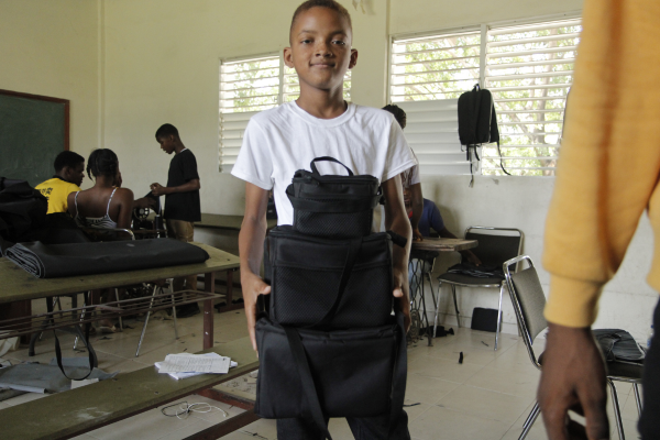 Haitian child heading to school at FWAL Community School