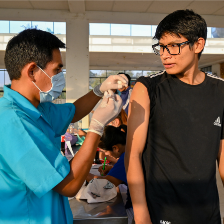 Youth Getting Vaccination Shot at NPH Peru